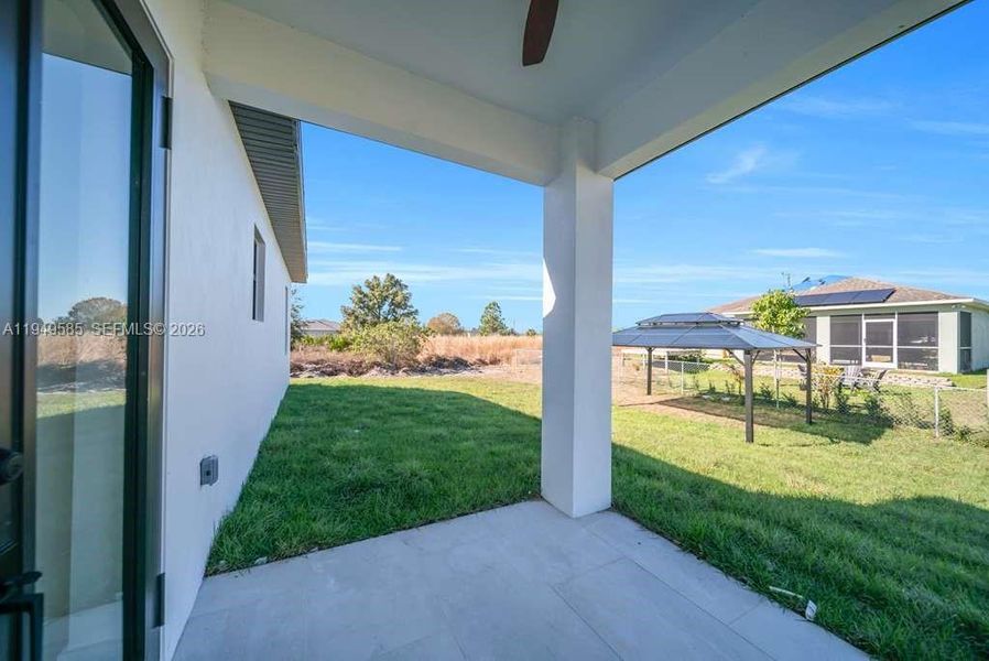 Exterior details and patio area of a home in , Lehigh Acres (Image 3). Exterior details and patio area of a home in , Lehigh Acres (Image 3).