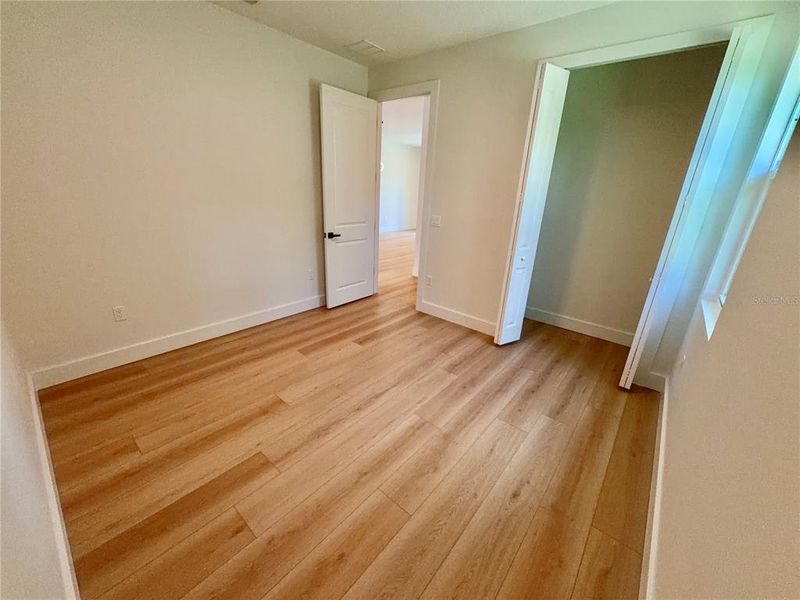 Spacious, unfurnished interior of a new home in , Port Charlotte (Image 57).