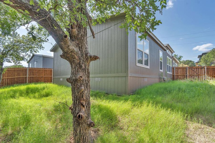 Exterior details and patio area of a home in , Granbury (Image 17).