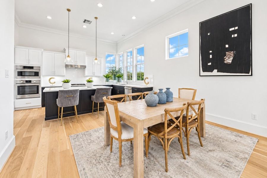 Wood floors throughout and windows everywhere!
