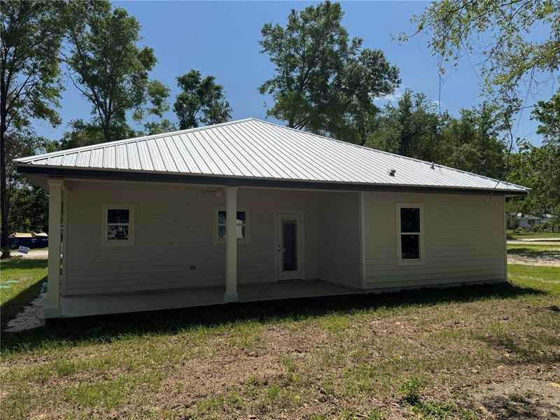 Front exterior of a new home in , Trenton, FL, highlighting curb appeal (Image 19).