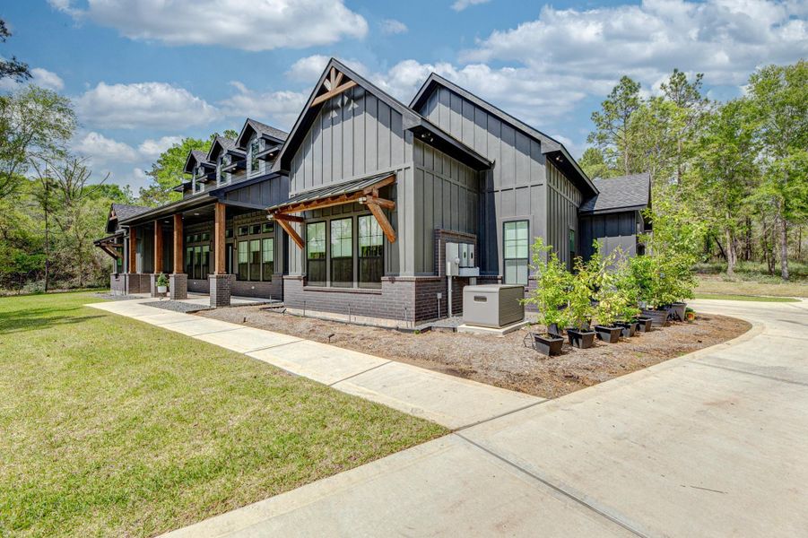 Front exterior of a new home in , Willis, TX, highlighting curb appeal (Image 24).