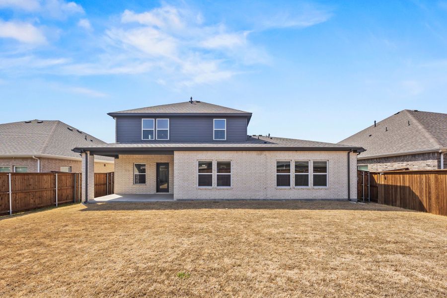 A house with a fence around it.
