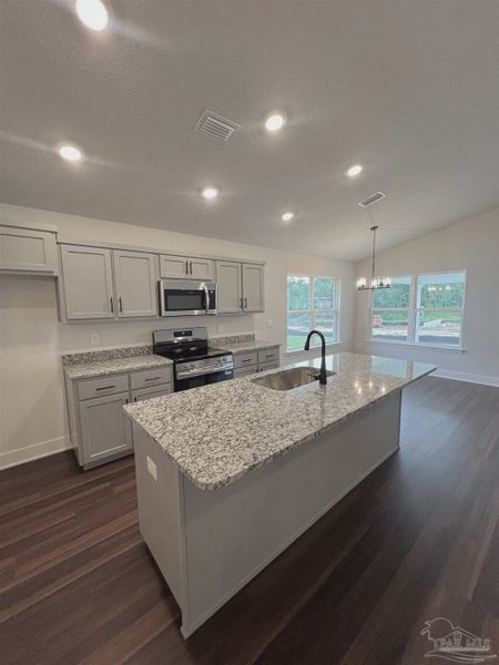 Furnished interior view inside a new home in Pine Top, Cantonment (Image 4).