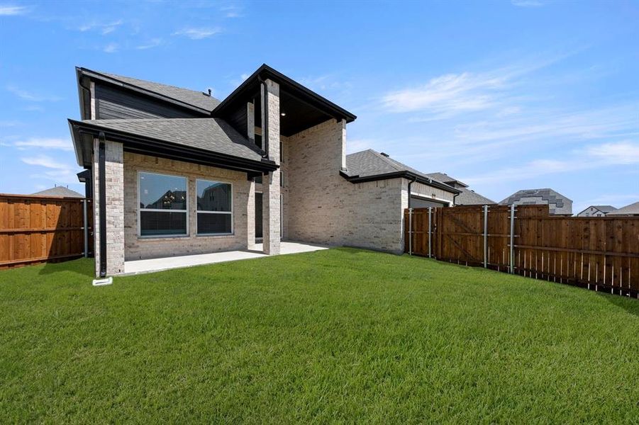 Exterior details and patio area of a home in Villages of Creekwood, Frisco (Image 4).