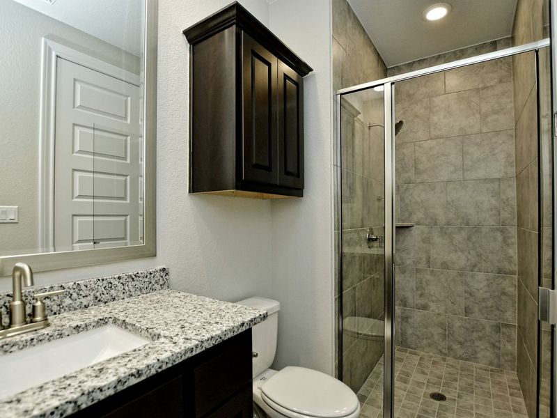 Representative furnished interior of a home built from the Madera II by Giddens Homes in Scofield Farms Estates, Georgetown (Image 241).