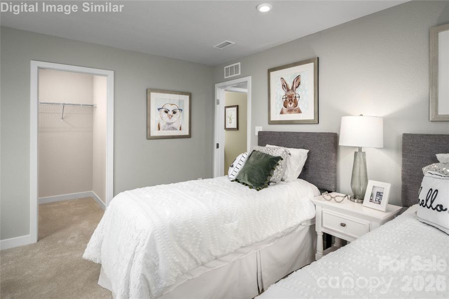 Say goodbye to clutter and hello to calm in this kid-friendly haven packed with closet space galore! From shoes to clothes to toys, everything has its place—making cleanup a breeze and playtime stress-free. It’s a room where organization meets imagination.