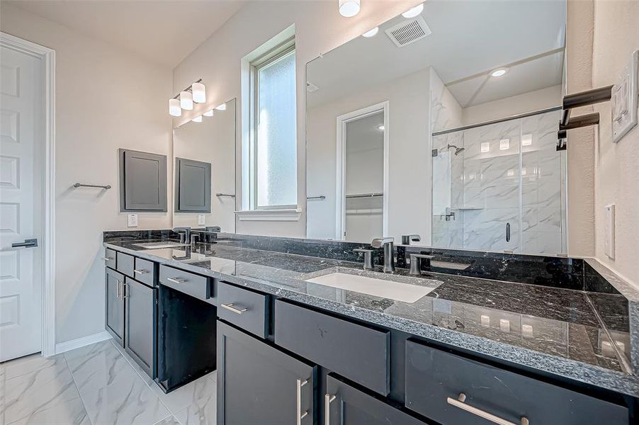 Luxury bathrooms with dual vanities.