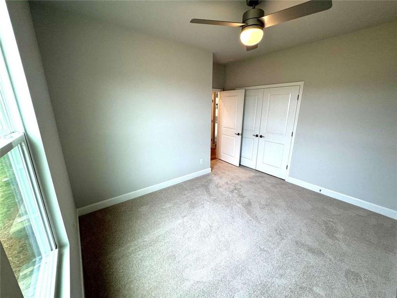 Spacious, unfurnished interior of a new home in Lakecrest, Buford (Image 11).