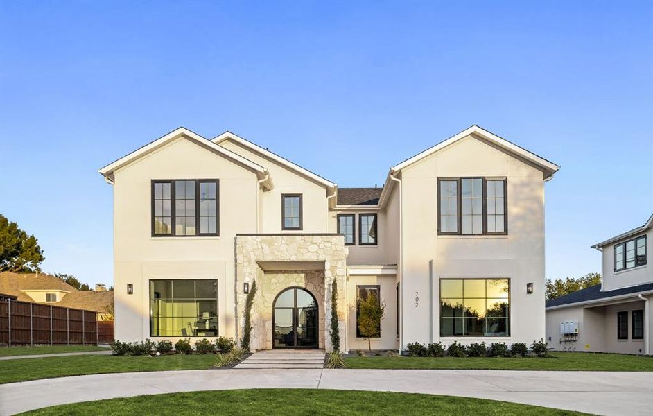 View of front of property with stucco siding and stone siding View of front of property with stucco siding and stone siding