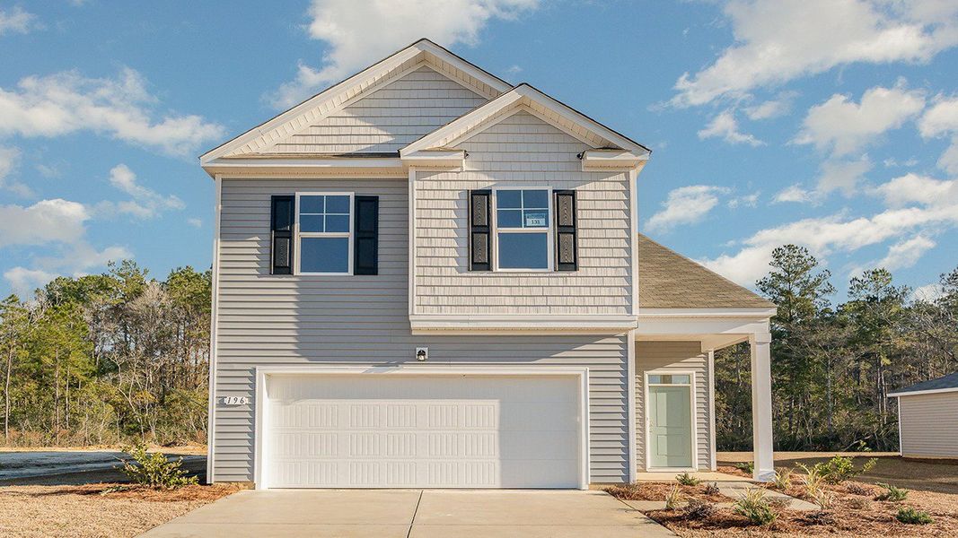 Representative exterior photo of a completed home built from the WREN by D.R. Horton in Stanbury Creek, Supply, NC (Image 1).