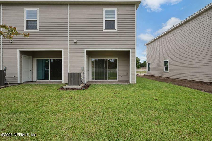 Front exterior of a new home in Sabal Terrace, Jacksonville, FL, highlighting curb appeal (Image 16).