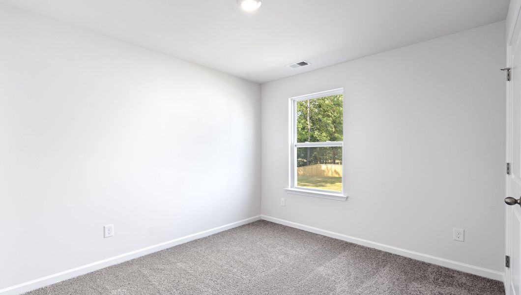 Spacious, unfurnished interior of a new home in Ravencrest, Roebuck (Image 12).