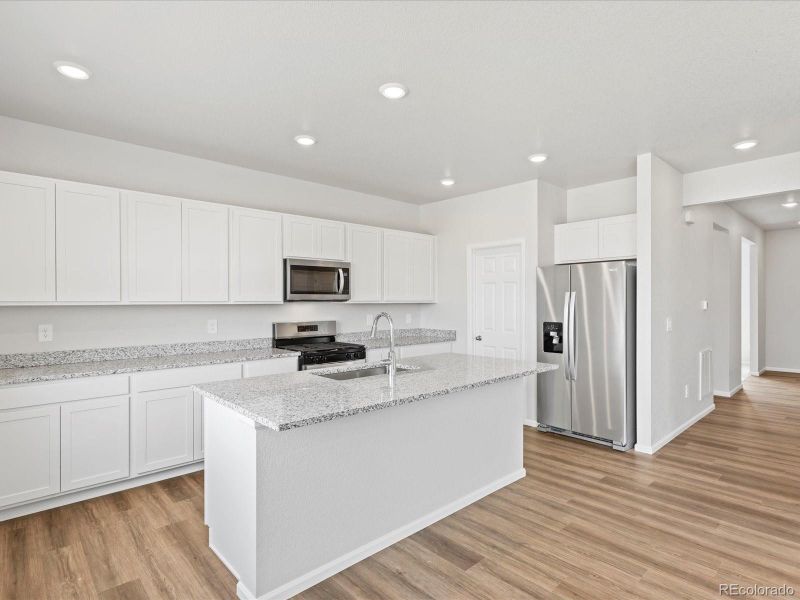 Furnished interior view inside a new home in Westgate, Greeley (Image 9).