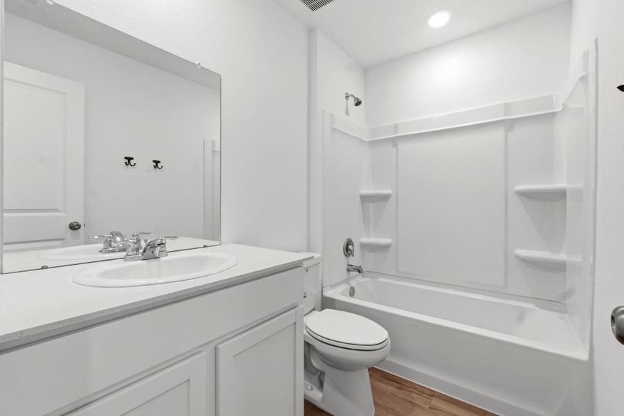 Furnished interior view inside a new home in Tavola, New Caney (Image 11).