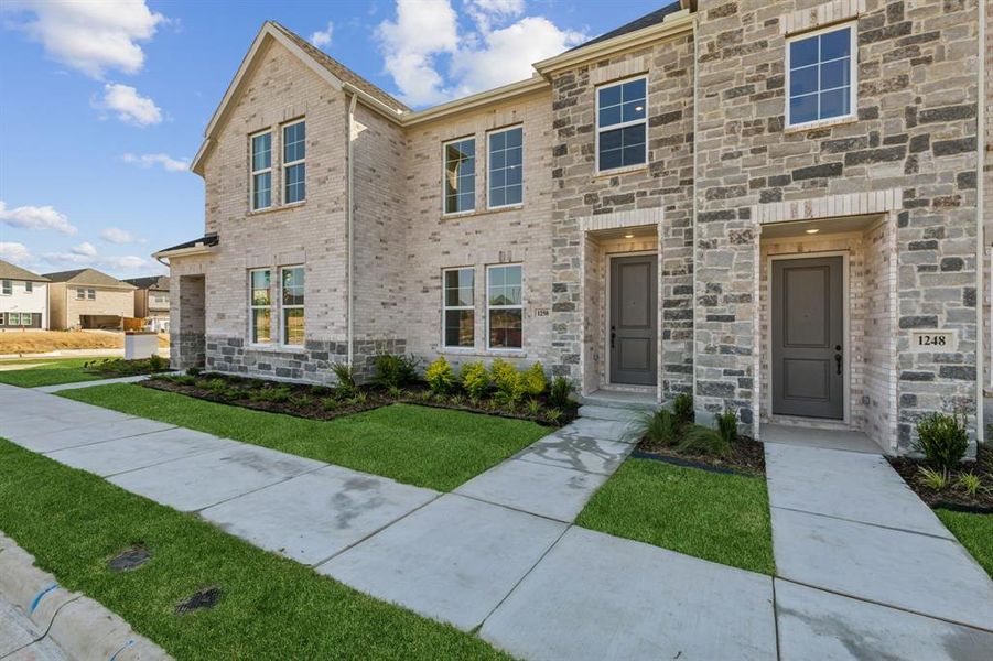 With a stunning brick and stone exterior, this home offers fantastic curb appeal!