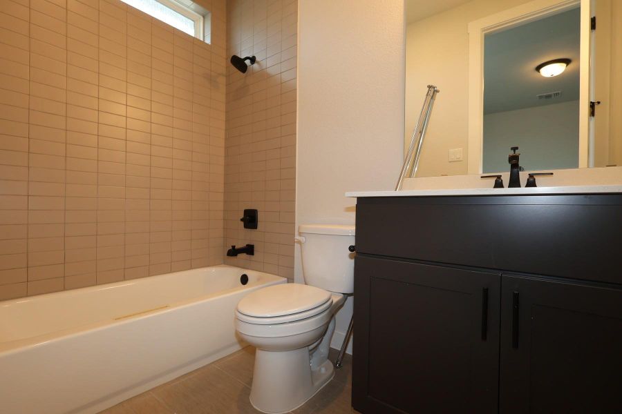 Furnished interior view inside a new home in Flora, Hutto (Image 6).