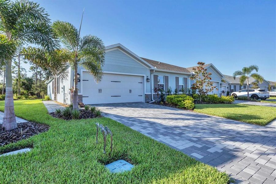Front exterior of a new home in , Port Charlotte, FL, highlighting curb appeal (Image 18). Front exterior of a new home in , Port Charlotte, FL, highlighting curb appeal (Image 18).