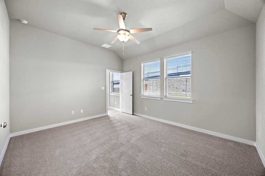 Primary Suite in the Cedar home plan by Trophy Signature Homes – REPRESENTATIVE PHOTO