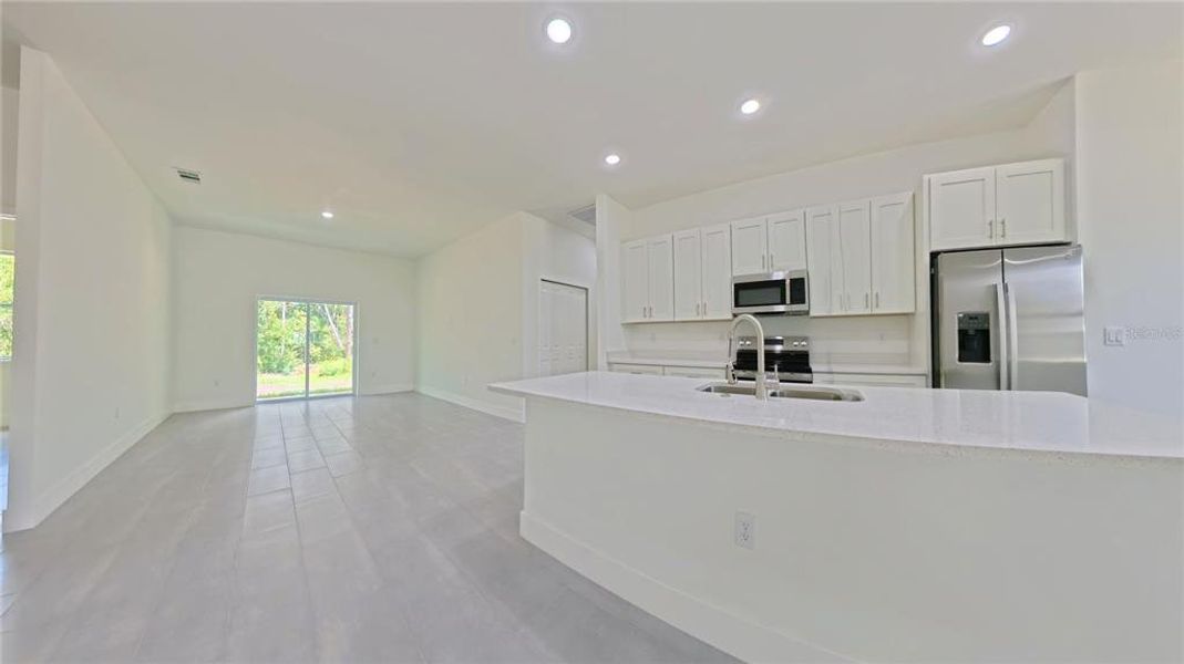 Furnished interior view inside a new home in , Dunnellon (Image 11).