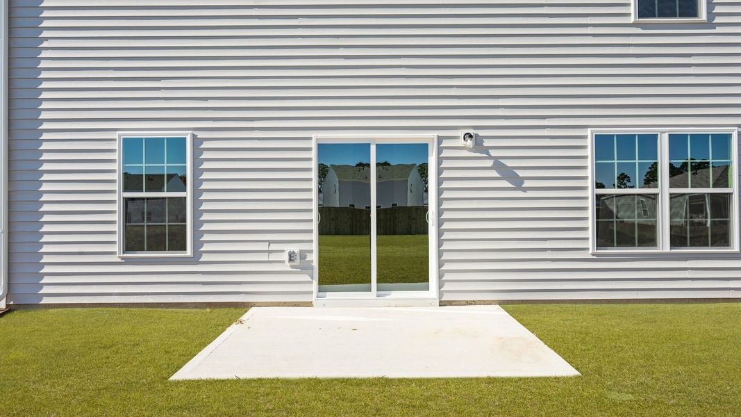 Exterior details and patio area of a home in Madeline Farm, New Bern (Image 4).