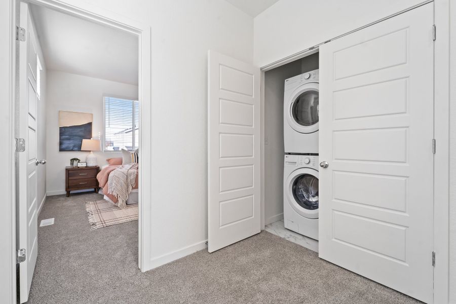 Front exterior of a new home in Liberty Draw, Evans, CO, highlighting curb appeal (Image 9). Front exterior of a new home in Liberty Draw, Evans, CO, highlighting curb appeal (Image 9).