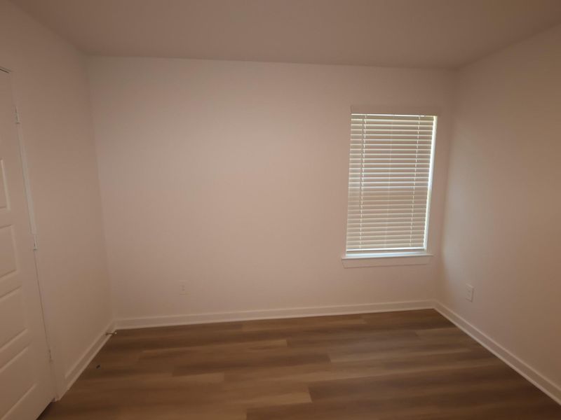 Spacious, unfurnished interior of a new home in Pinewood at Grand Texas, New Caney (Image 14).