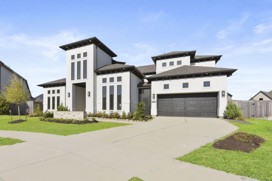 Front exterior of a new home in , Cypress, TX, highlighting curb appeal (Image 2). Front exterior of a new home in , Cypress, TX, highlighting curb appeal (Image 2).