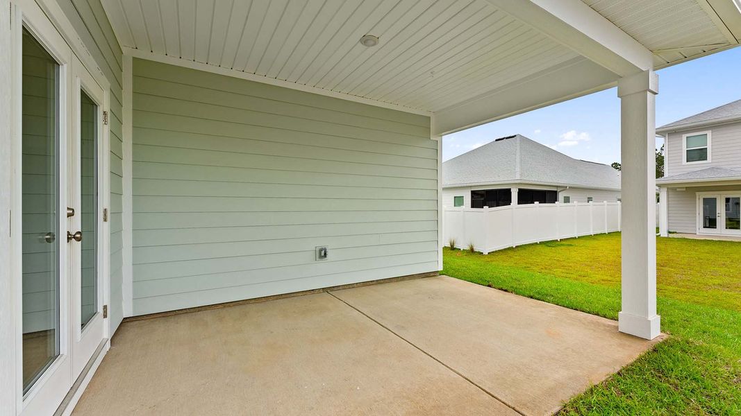 Exterior details and patio area of a home in Bayside at Ward Creek, Panama City Beach (Image 4).