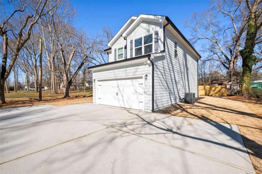 Front exterior of a new home in , Griffin, GA, highlighting curb appeal (Image 23).