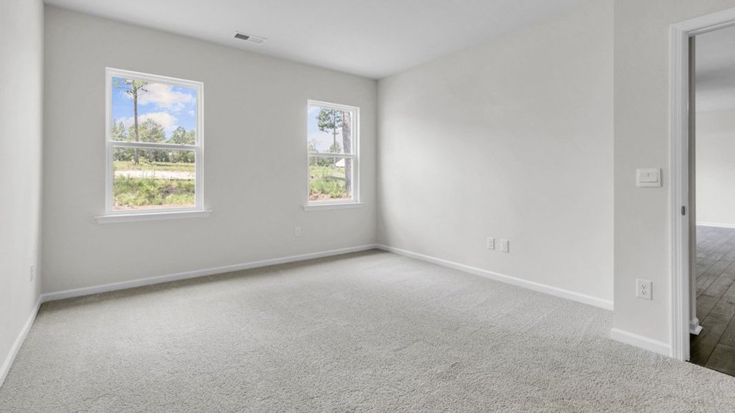 Spacious, unfurnished interior of a new home in Villa Grande, Winterville (Image 28).