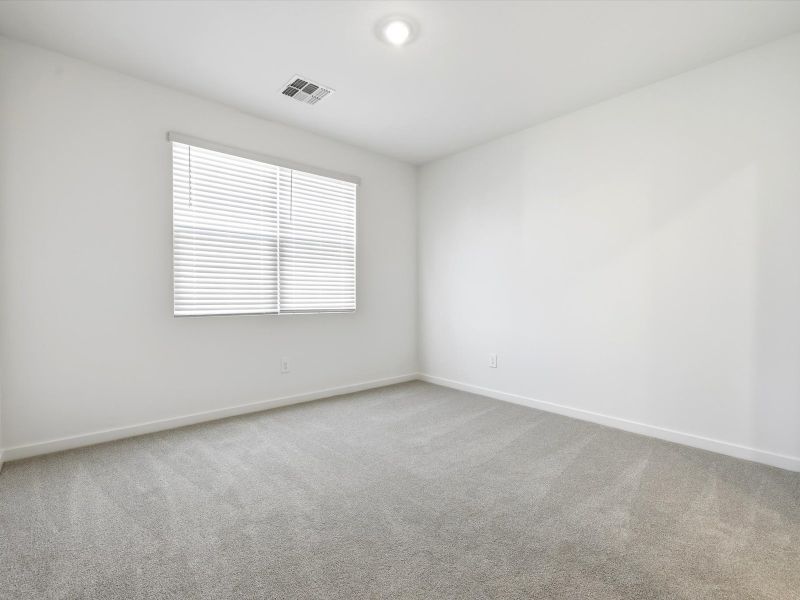 Spacious, unfurnished interior of a new home in Rancho Mirage Estate Series, Maricopa (Image 8).