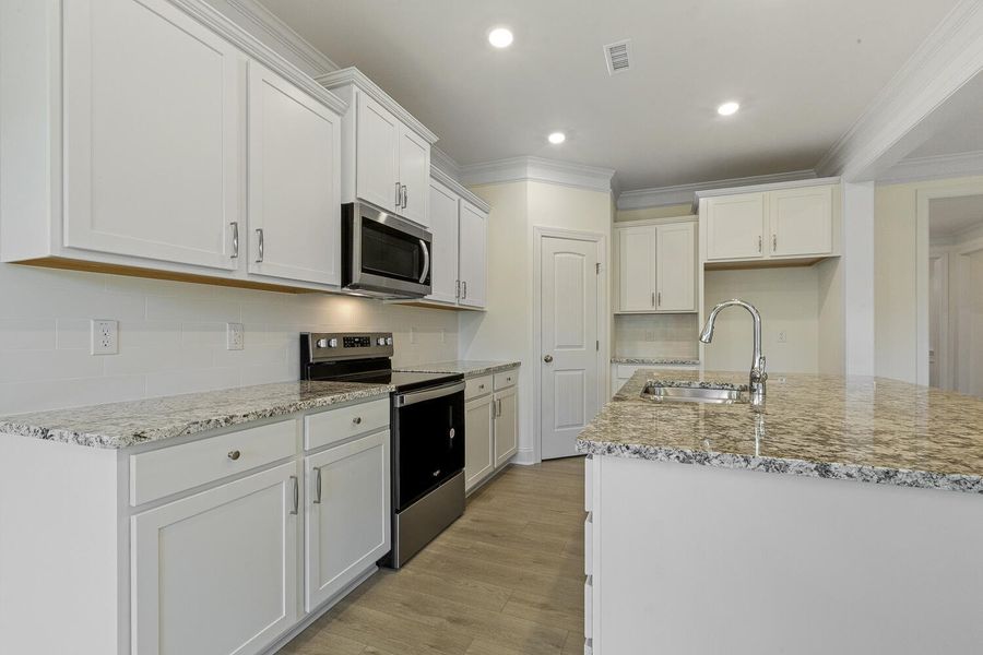 Furnished interior view inside a new home in Berea Farms, Four Oaks (Image 7).