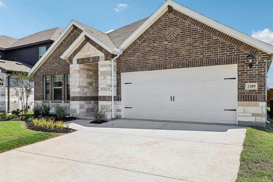Front exterior of a new home in Lakehaven - Signature Series, Farmersville, TX, highlighting curb appeal (Image 2).