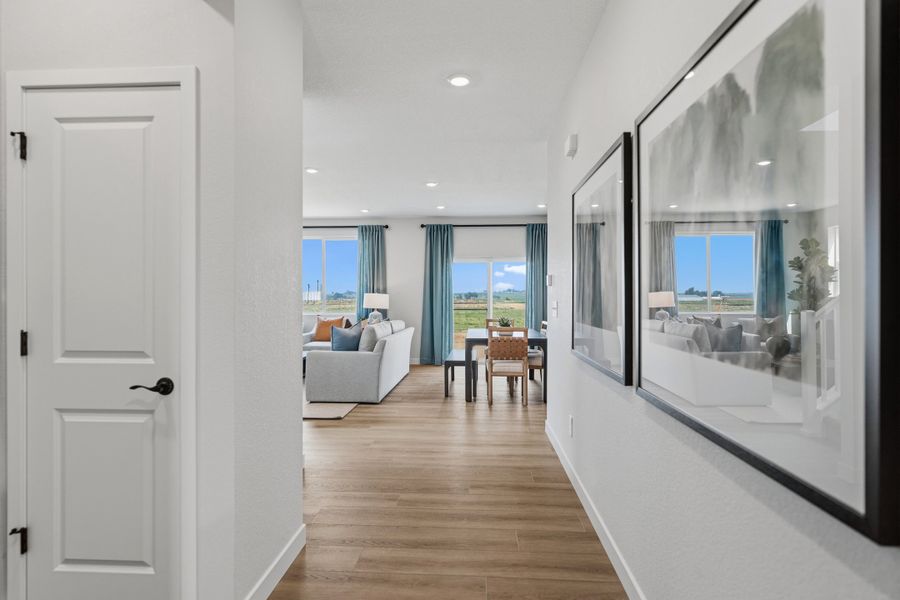 Representative furnished interior of a home built from the 4006 by Risewell Homes in Mead Crossing, Mead (Image 4).