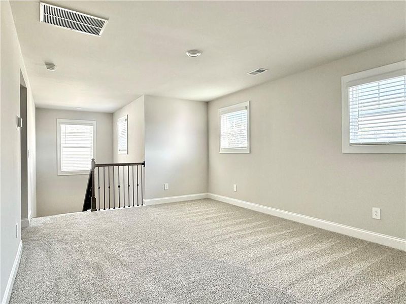 Spacious, unfurnished interior of a new home in Vines at Mill Creek - Legacy Series, Braselton (Image 30).