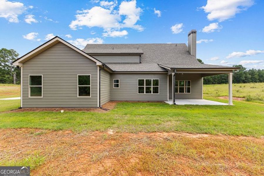 Front exterior of a new home in The Dairy, Hogansville, GA, highlighting curb appeal (Image 2).