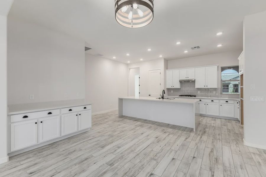 Furnished interior view inside a new home in Valencia at Granite Vista, Waddell (Image 5).