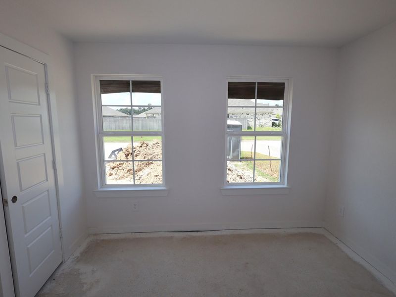 Spacious, unfurnished interior of a new home in Pinewood at Grand Texas, New Caney (Image 12).