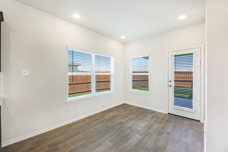 Representative exterior photo of a completed home built from the Lockhart by Impression Homes in Heartland, Heartland, TX (Image 15).