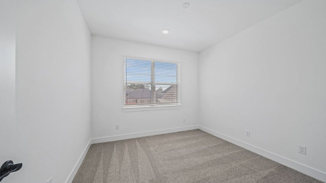 Representative unfurnished interior of a home built from the Waterloo by Chesmar Homes in Attwater 65's, Waller (Image 39).