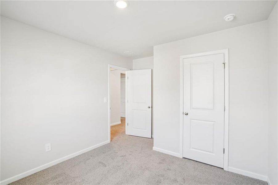 Spacious, unfurnished interior of a new home in Hawthorne Station, College Park (Image 27).