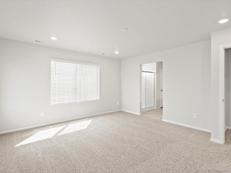 Spacious, unfurnished interior of a new home in Poudre Heights: The Lakes Collection, Windsor (Image 12).