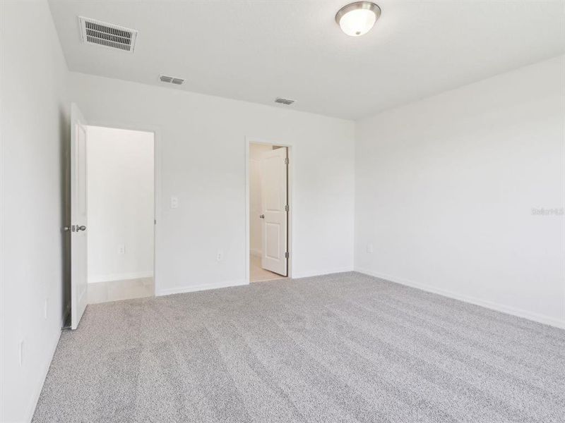 Spacious, unfurnished interior of a new home in The Reserve at Van Oaks, Auburndale (Image 21).