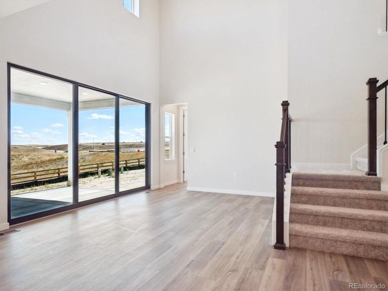 Spacious, unfurnished interior of a new home in Trails at Smoky Hill, Parker (Image 24).
