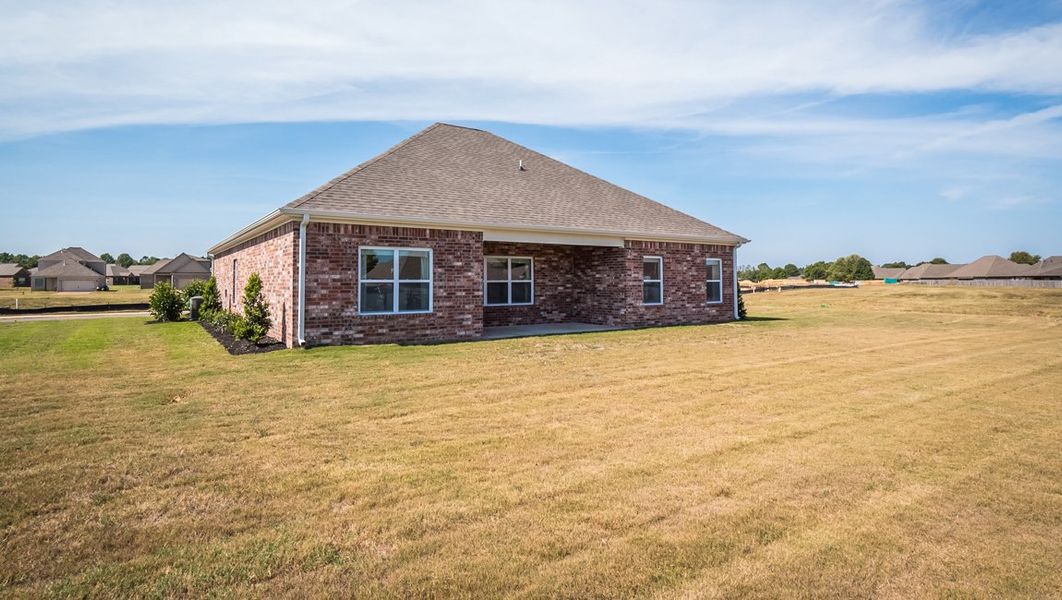 Representative exterior photo of a completed home built from the CAIRN by D.R. Horton in Riverwood Gardens, Oakland, TN (Image 21).