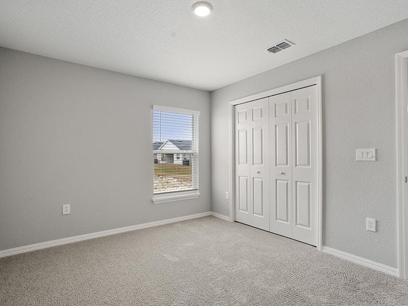 Large secondary bedrooms provide space for everyone in your household - Paisley by Highland Homes