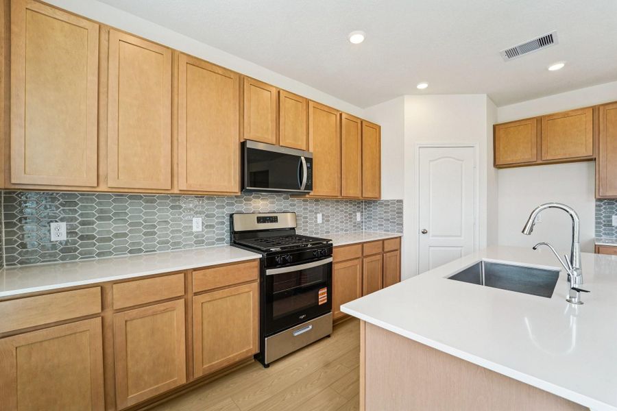 Furnished interior view inside a new home in Olympia Falls, Fresno (Image 11).