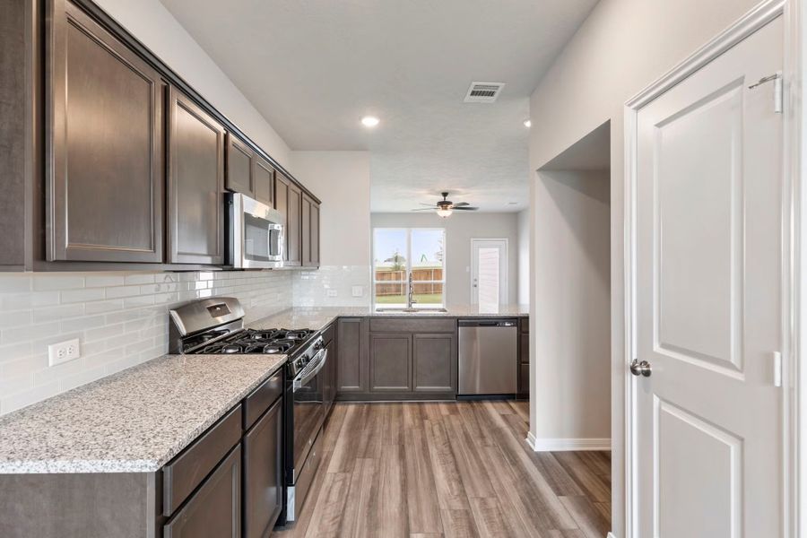 Furnished interior view inside a new home in Eastern Wells, Jarrell (Image 32).