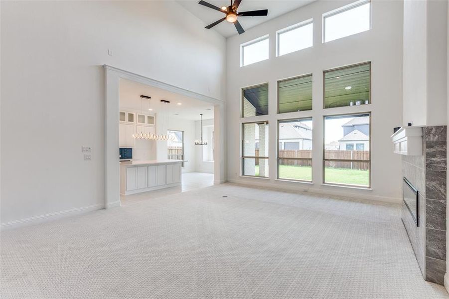 Large windows and a high ceiling.